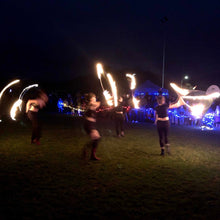 Load image into Gallery viewer, four fire performers with flaming hoops
