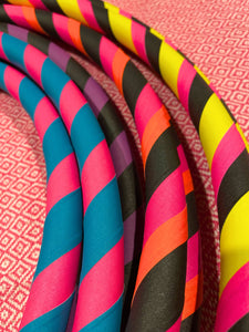 colorful taped hula hoops in various colours