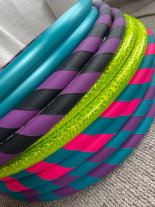 striped hula hoops with colourful griptape for fitness