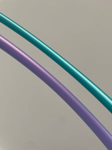 section of teal and purple hula hoops