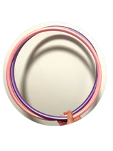 Load image into Gallery viewer, hula hoop that is two different colours double coiled for travel
